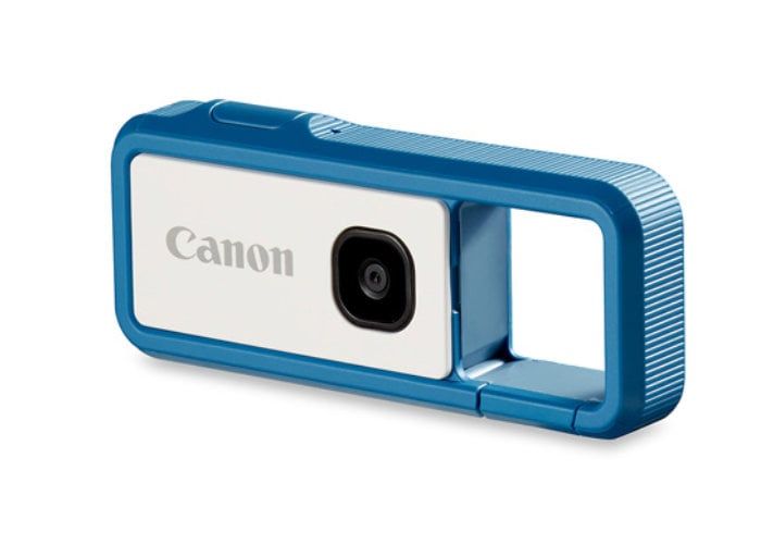 a camera that is blue and white with the word canon on it's side