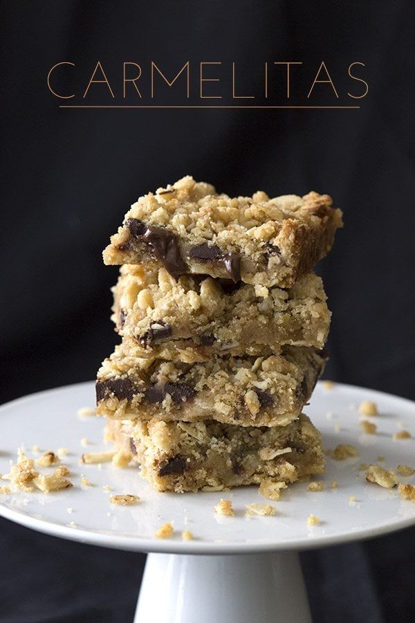 three pieces of granola sitting on top of a white cake plate with text overlay