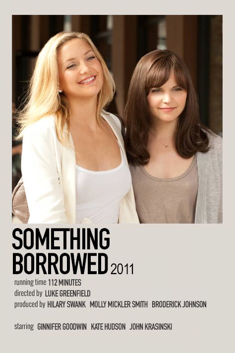 two women standing next to each other in front of a white sign that says something borrowed 2011