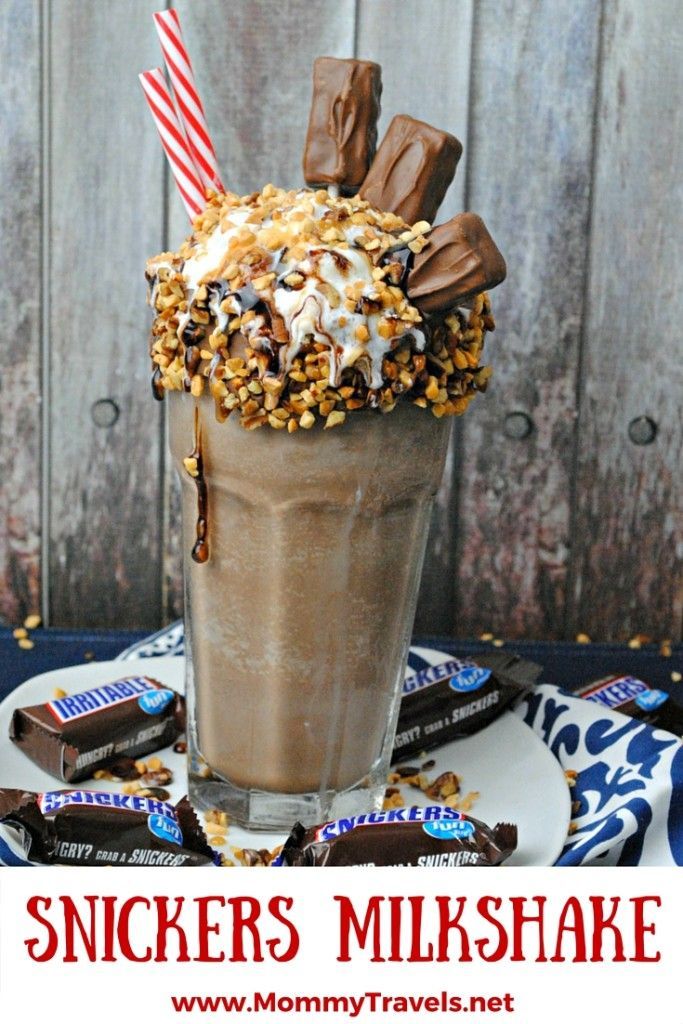 an ice cream sundae with chocolate, marshmallows and candy