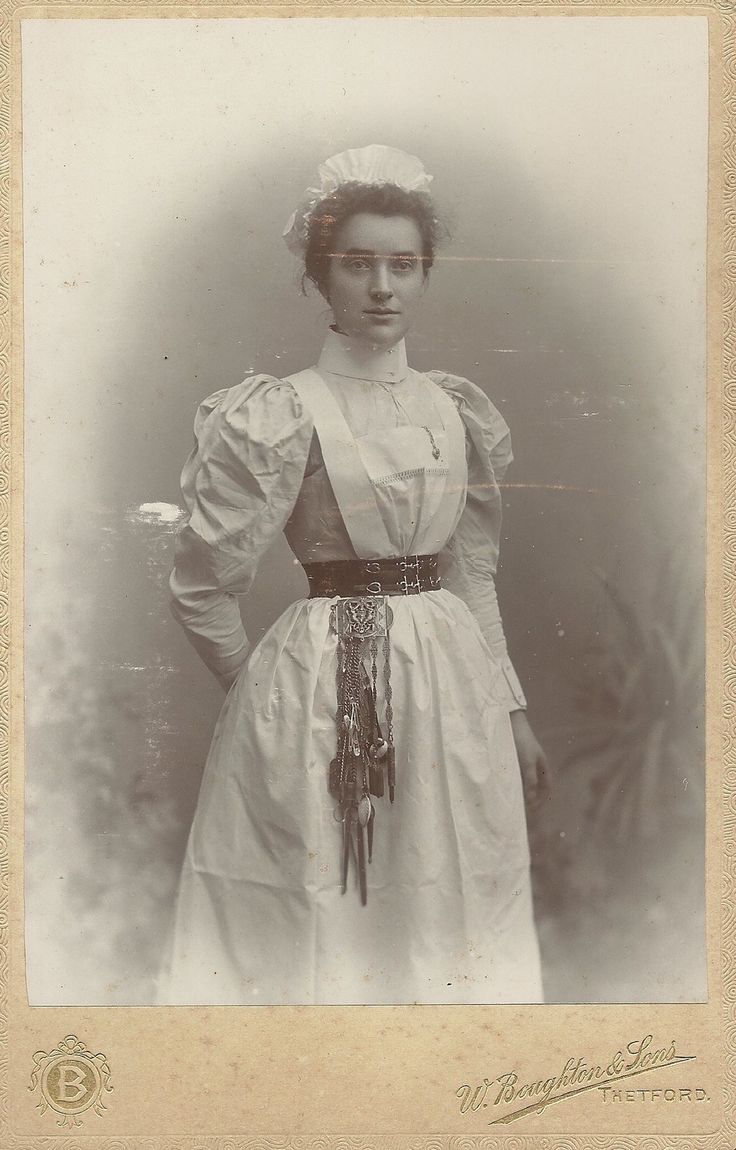 https://flic.kr/p/SxF6rR | Unidentified Nurse,Thetford Cabinet Card | the  Chatelaine attached to her belt looks to be so heavy that she needs a reinforced belt! Chatelaine Belt, Victorian Doctor, Victorian Maid, Doctor Outfit, Nurse Aesthetic, Vintage Nurse, Dress History, Uniform Dress, 19th Century Fashion