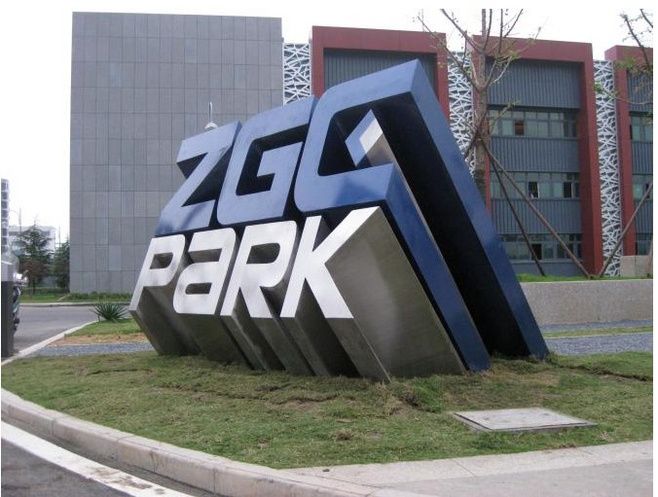 a large sign that says zgg park in front of a building