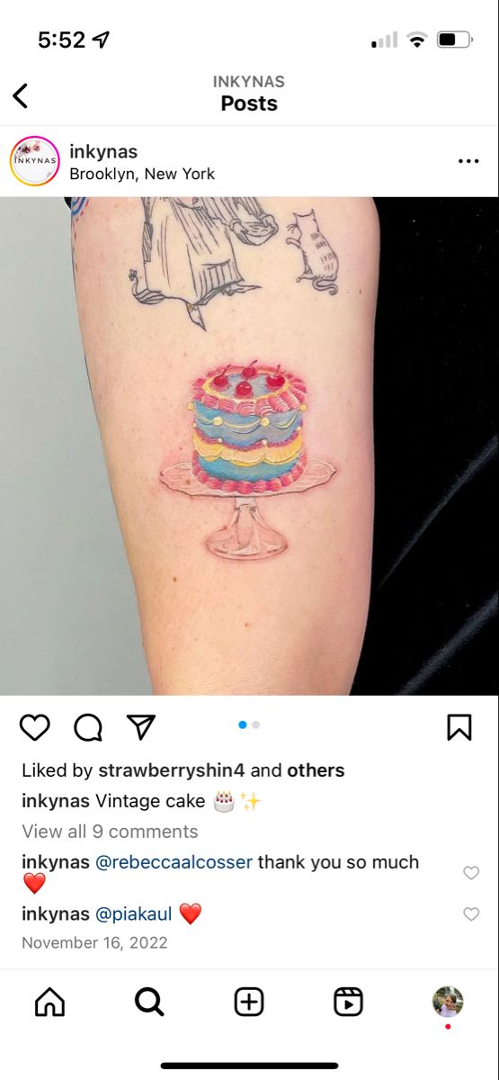 a woman with a cake tattoo on her arm