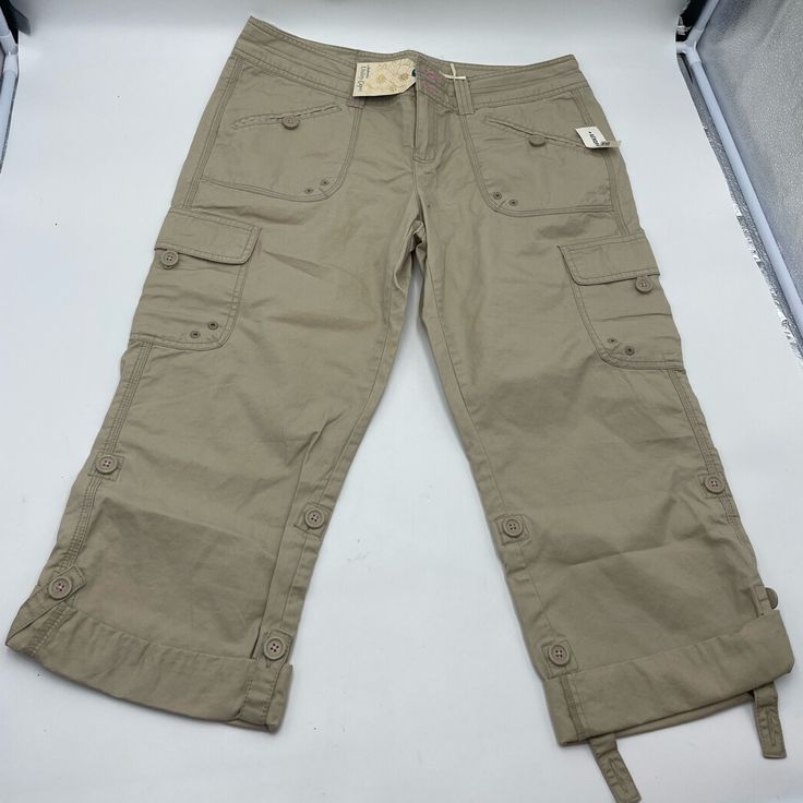 New With Tags Cargo Utility Capris Casual Knee-length Pants With Cargo Pockets, Casual Summer Cargo Capri Pants, Casual Cotton Capri Cargo Pants, Casual Capri Length Cargo Pants For Summer, Casual Summer Capri-length Cargo Pants, Summer Cotton Cargo Capri Pants, Summer Cotton Cargo Pants Capri Length, Spring Casual Cargo Style Capris, Casual Summer Capris With Cargo Pockets