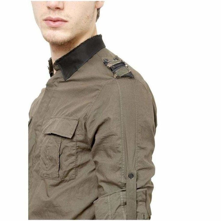 Military style provides a constant source of inspiration for Balmain and this khaki-green shirt is infused with utilitarian details Roll-up sleeves. A satin collar and matching striped epaulettes Deconstructed hidden button-down collar Double patch button-flap pockets Double-button barrel cuffs Shoulder yoke at vertical seaming at back shirttail hem . Cotton Machine wash Made in France Color: green Pit to Pit: 22.5" Waist: 44" Shoulder to Shoulder: 18" Length from shoulder: 31" Khaki Long Sleeve Tops With Cargo Pockets, Green Workwear Tops With Flap Pockets, Green Tops With Flap Pockets For Work, Khaki Collared Tops With Cargo Pockets, Olive Military Style Tops For Fall, Khaki Military Collared Shirt, Khaki Collared Military Shirt, Green Military Style Workwear Top, Green Military Style Work Tops