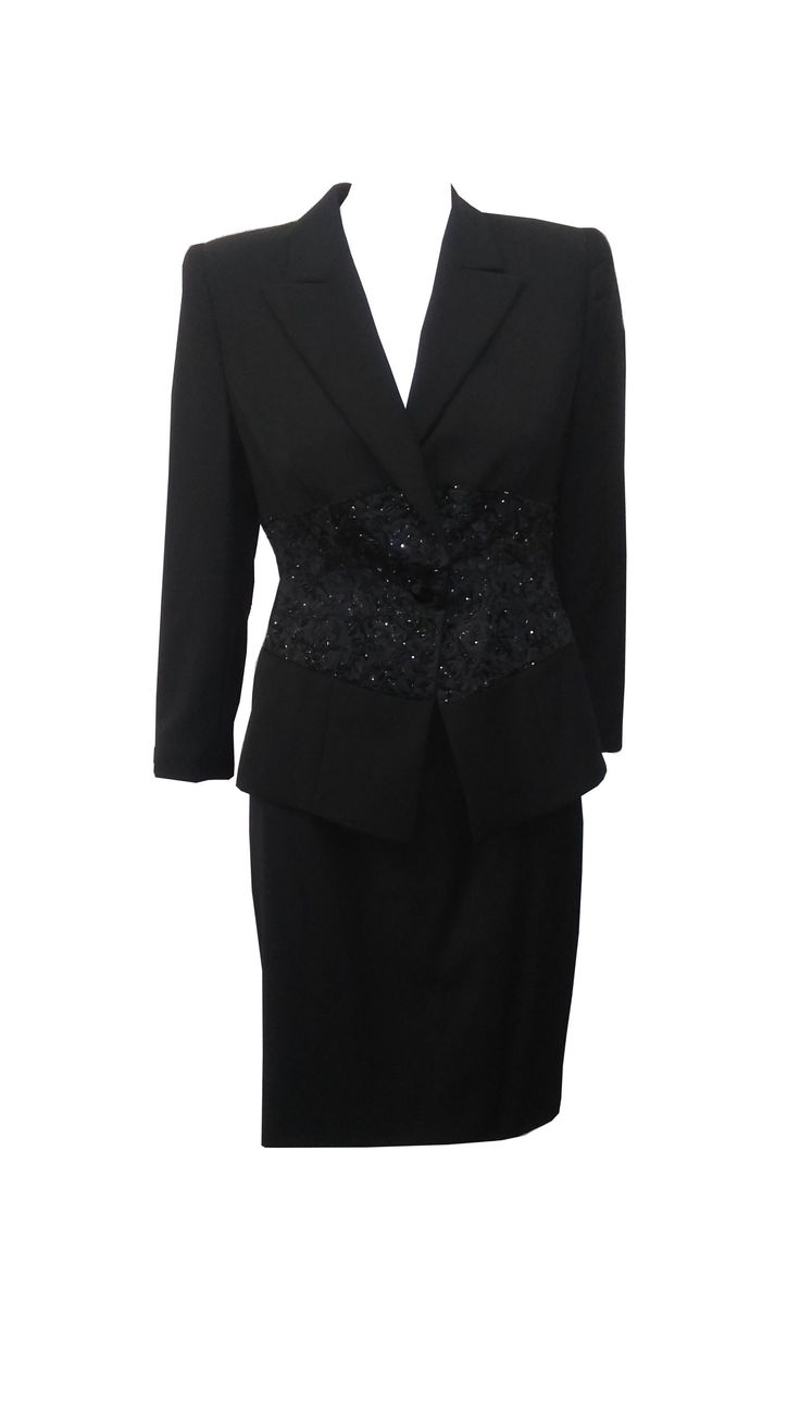 Long sleeve black rayon jacket with a beaded waist and a one button down closure and matching knee length skirt with a back closure and vent.  Pr-Owned in very good condition.    -Jacket:  Sleeves-21'  Shoulder- 15'  Length- 22'  Bust-38'  -Skirt:  Waist-32'  Hips-40'  Length-21'   *PLEASE EMAIL FOR INTERNATIONAL SHIPPING PRICES Formal Black Fitted Skirt Suit, Black Fitted Skirt Suit For Formal Occasions, Elegant Fitted Black Skirt Suit, Elegant Black Skirt Suit For Formal Occasions, Elegant Fitted Winter Skirt Suit, Fitted Black Skirt Suit For Winter, Winter Black Fitted Skirt Suit, Black Long Sleeve Skirt Suit For Evening, Embellished Fitted Suit For Night Out