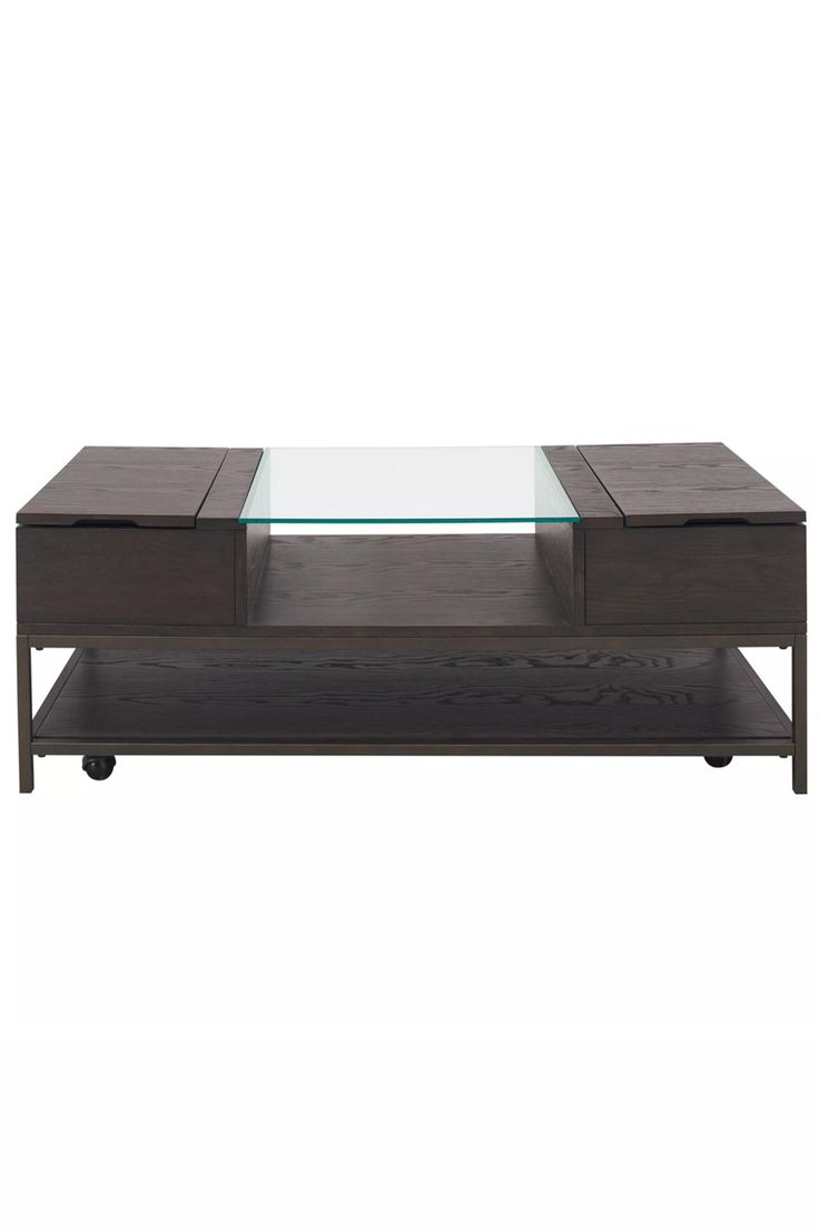 a coffee table with glass top and wheels