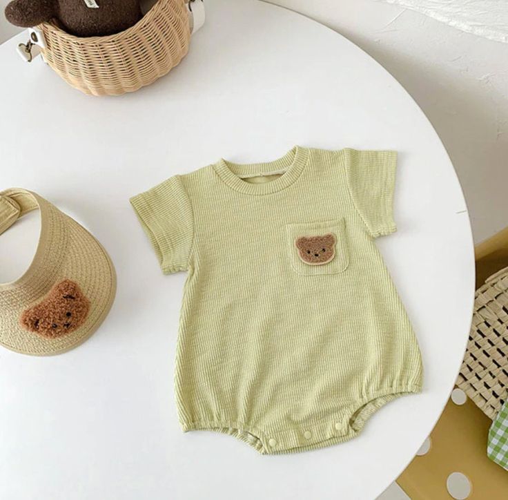 Soft Teddy Bear Pocket bodysuit Onesie Material: 95% Cotton, 5% Spandex Size (IN) Size Length Bust 3-6m 16.14 10.24 6-9m 16.93 10.63 12m 17.72 11.02 24m 18.50 11.42 Cute Green Bodysuit For Playtime, Green Playful Bodysuit For Playtime, Summer Solid Color Bodysuit For Playtime, Green Short Sleeve Bubble Romper For Summer, Green Cotton Short-sleeve Onesie, Green Cotton Short Sleeve Onesie, Green Short Sleeve Cotton Onesie, Casual Green Short Sleeve Bodysuit, Green Cotton Shortsleeved Onesie