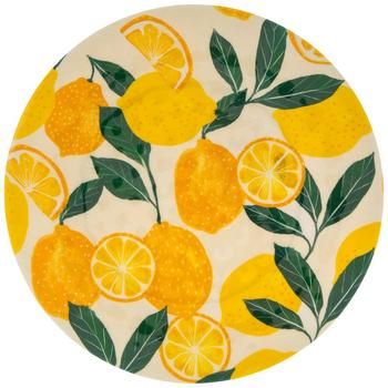 a plate with lemons and leaves painted on the front in yellow, green and white