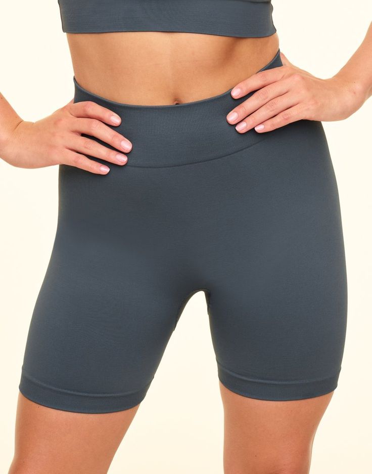 Looking for a bike short that does it all? This seamless and super soft one is your new go-to for workouts, long days, and everything in between. With a high-rise wide waist panel, unique fabric, and moisture-wicking layer, it’ll keep you cool, dry, and looking & feeling your best all day long. (Available in sizes XS-XL.) Gray Seamless Workout Bottoms, High Stretch Go-dry Athletic Shorts, Mid-thigh Length, Compressive Seamless Gray Activewear, Compressive Gray Seamless Activewear, Gray Compressive Athletic Shorts For Workout, Gray Compressive Moisture-wicking Athletic Shorts, Gray High Stretch Athletic Shorts For Yoga, Gray Athleisure Activewear With Built-in Shorts, Gray Athleisure Biker Shorts For Training