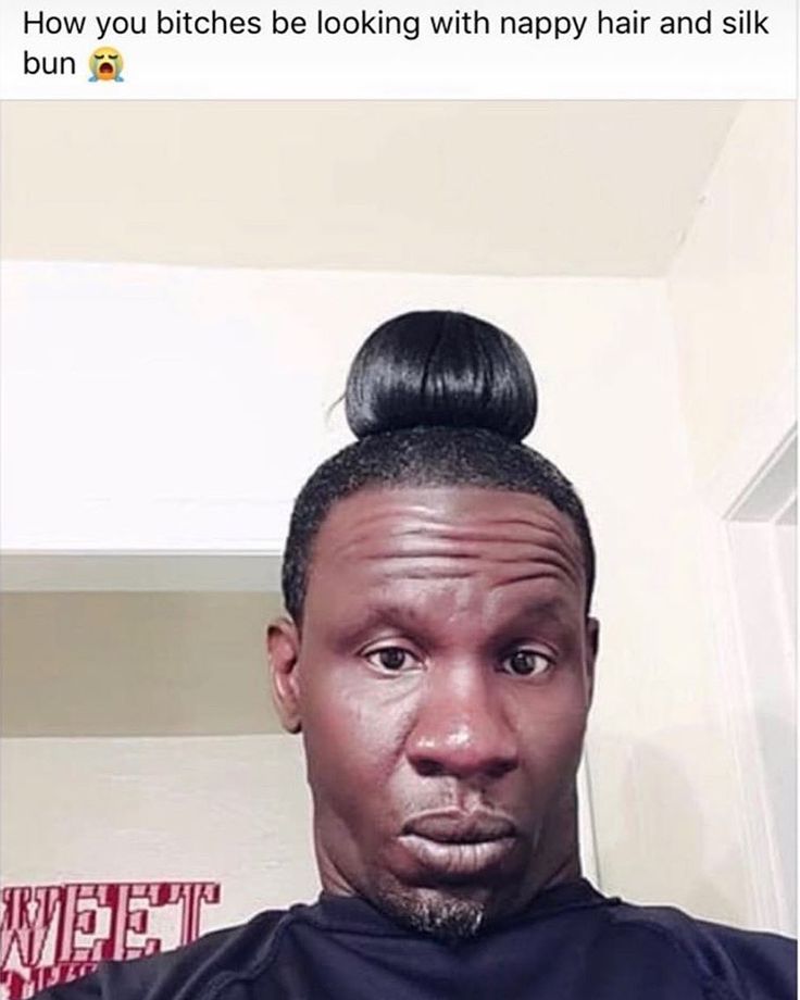 a man with a bun on top of his head