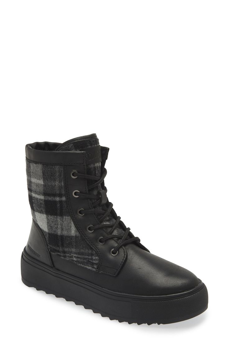 Ground your look in the utilitarian attitude of a lace-up combat boot set on a sturdy sawtoothed sole. Waterproof: protects against rain, puddles and slush to keep feet dry in wet conditions 1" platform Lace-up style; side zip closure Leather and textile upper/synthetic lining/rubber sole Imported Black Weatherproof Lace-up Boots For Outdoor, Black Combat Lace-up Boots, Rugged Insulated Lace-up Combat Boots, Black Combat Boots With Reinforced Toe For Fall, Winter Lace-up Boots With Reinforced Toe, Winter Lace-up Moto Boots With Reinforced Toe, Black Combat Boots With Lug Sole For Outdoor Activities, Black Combat Boots With Lug Sole For Outdoor, Trendy Ankle Combat Boots For Outdoor