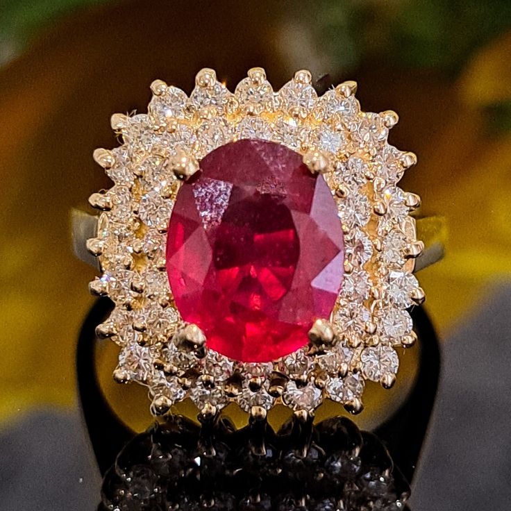 This Ruby is authentic as they are grown in a lab environment. 3.75 Carat Lab-created Ruby & Natural Diamonds 14k Solid Yellow Gold Ring Ring Material: 14k Solid Gold Approximate Weight: 5.8 Grams Band Width about 2.0 mm Gemstone: Lab-created Ruby Gemstone Color: Red Gemstone Clarity: Moderately Included Gemstone Shape: Oval Gemstone Dimensions are about: 9.70x7.90 mm Gemstone Carat Weight about: 2.80 Carat Gemstone Quantity: 1 Diamonds: Natural Round Shaped Diamonds Color: G Diamonds Clarity: S Gia Certified Oval Ruby Ring, Exquisite Oval Ruby Ring Gia Certified, Dazzling Oval Ruby Ring With Diamonds, Luxury Oval Diamond Ring With Lab-created Ruby, Oval Lab Grown Diamond Ring In Fine Jewelry Style, Fine Jewelry Oval Ring With Lab-grown Diamond, Timeless Oval Ruby Ring With Diamonds, Exquisite Oval Ruby Ring With Center Stone, Oval Ruby Ring With Diamond Center Stone