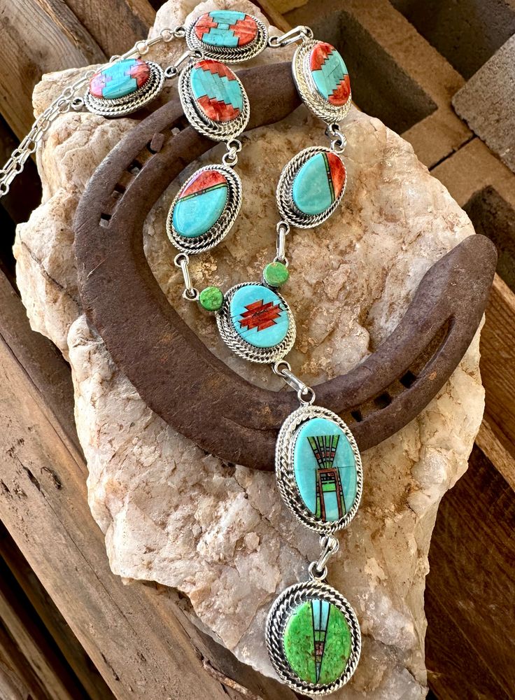 The design of the inlaid stones is so beautifully placed in this lariat necklace a stunning piece to add to any collection!! Luxury Southwestern Lariat Jewelry, Luxury Concho Lariat Jewelry, Luxury Multicolor Lariat Jewelry, Lariat Necklace, Native American Jewelry, Stone, Beauty, Design, Native American Jewellery