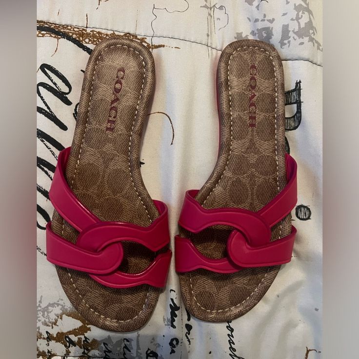 Brand New. Comes With Box Coach Pink Sandals For Beach, Coach Slide Sandals For Spring, Coach Pink Slip-on Sandals, Coach Pink Open Toe Sandals, Coach Open Toe Slides For Spring, Coach Sandals With Cushioned Footbed For Vacation, Pink Open Toe Coach Sandals, Trendy Coach Sandals For Vacation, Coach Pink Flat Sandals