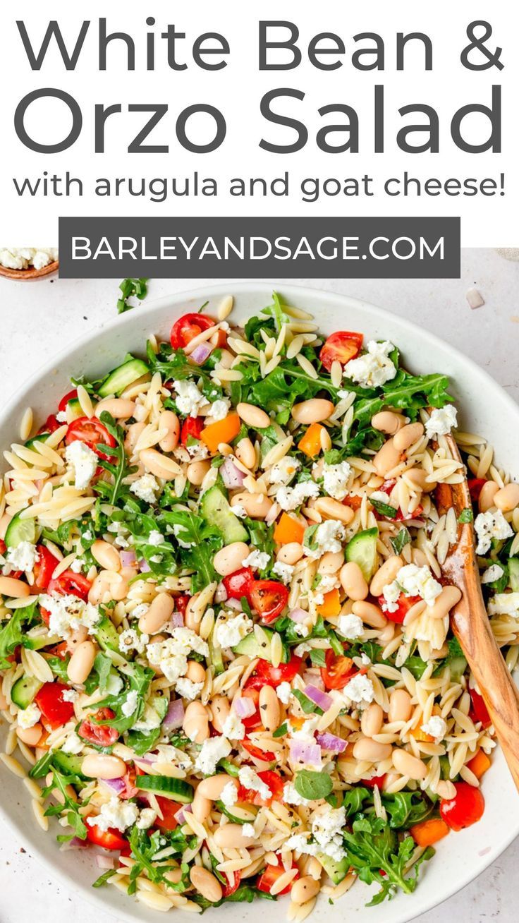 white bean and orzo salad with arugula and goat cheese in a bowl