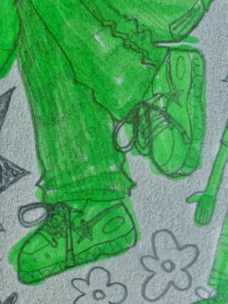 a drawing of a person with green pants and shoes