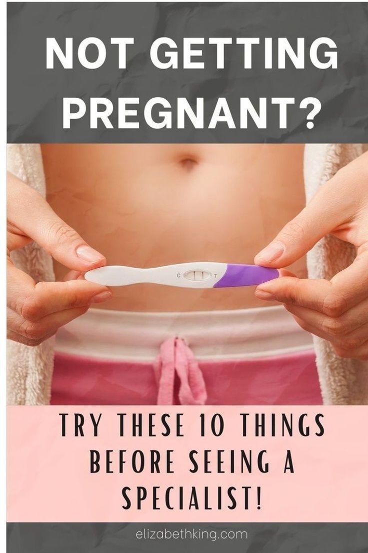 a woman holding a toothbrush in her hands with the caption not getting pregnant? try these 10 things before seeing a specialist