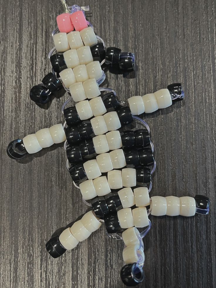 an animal made out of legos sitting on top of a table