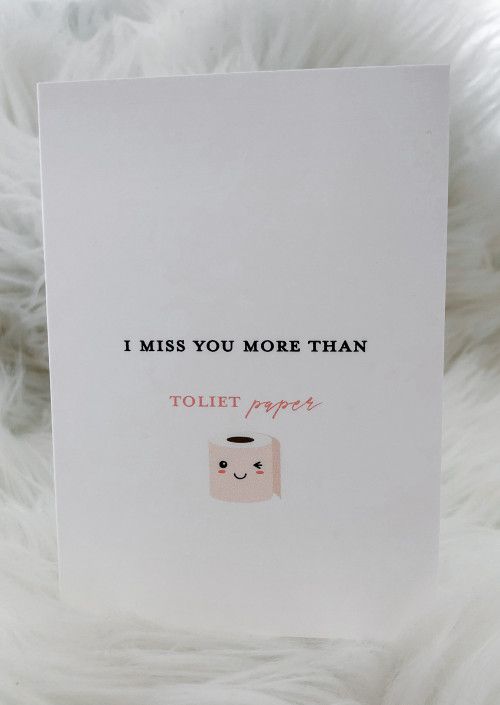 a card that says i miss you more than toilet paper