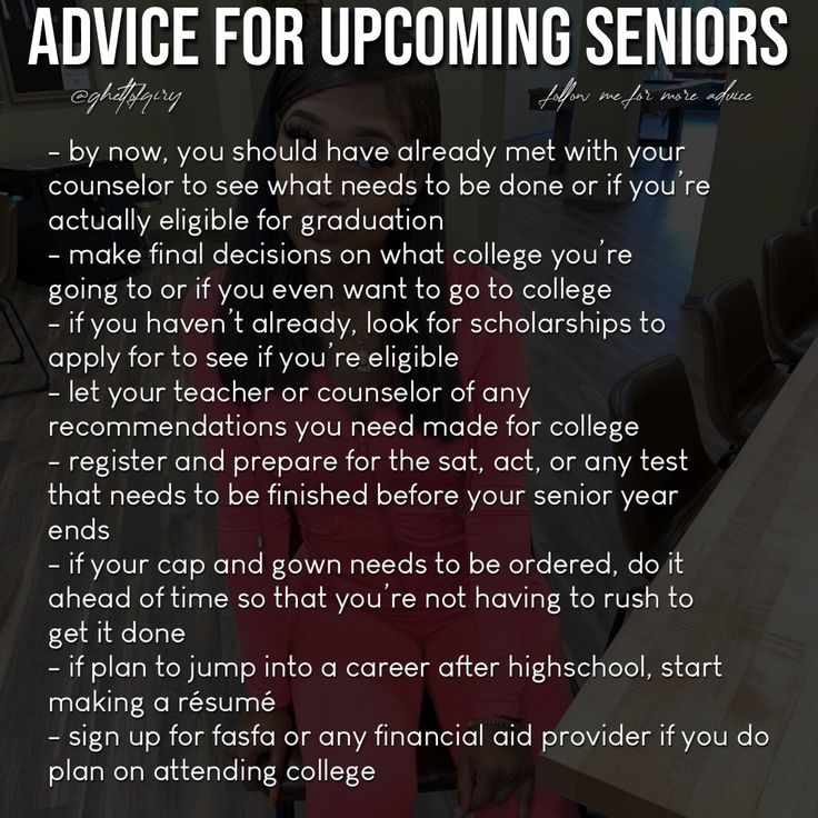 a woman sitting in front of a table with an ad for the school's upcoming senior