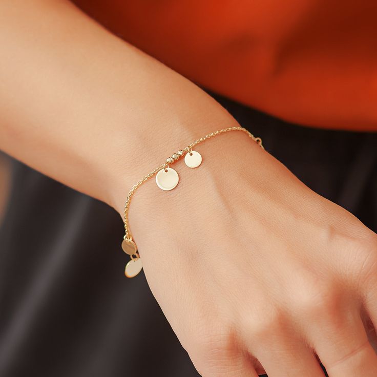 14k Solid Gold Disc Bracelet/Anklet, Custom Initial Engraved Gold Disc Coin Charm Bracelet/Anklet, Real Gold Multiple Letter Disc Pendant Bracelet Gift For Material: Solid Gold (Not Gold Filled or not Gold Plated) Karat: 14 K (585) (Real Gold) Small Disc: 6 mm Large Disc: 8 mm Bracelet Length: 6.0 inches - 8.5 inches Anklet Length: 9.0 inches - 12.0 inches We put an additional adjustment of 1 ring on the bracelets to use them 1 inch shorter. We put an additional adjustment of 2 rings on the ankl 14k Gold Bracelets With Polished Finish, Gold Charms Bracelet Fine Jewelry, Adjustable Yellow Gold Bracelets With Charms, Yellow Gold Bangle With Charms, Adjustable Gold Plated Bracelet With Charms, Adjustable Gold Plated Charm Bracelets, Adjustable Gold-plated Charm Bracelet, Adjustable Gold-plated Bracelet With Charms, Adjustable Gold Plated Bracelets With Charms