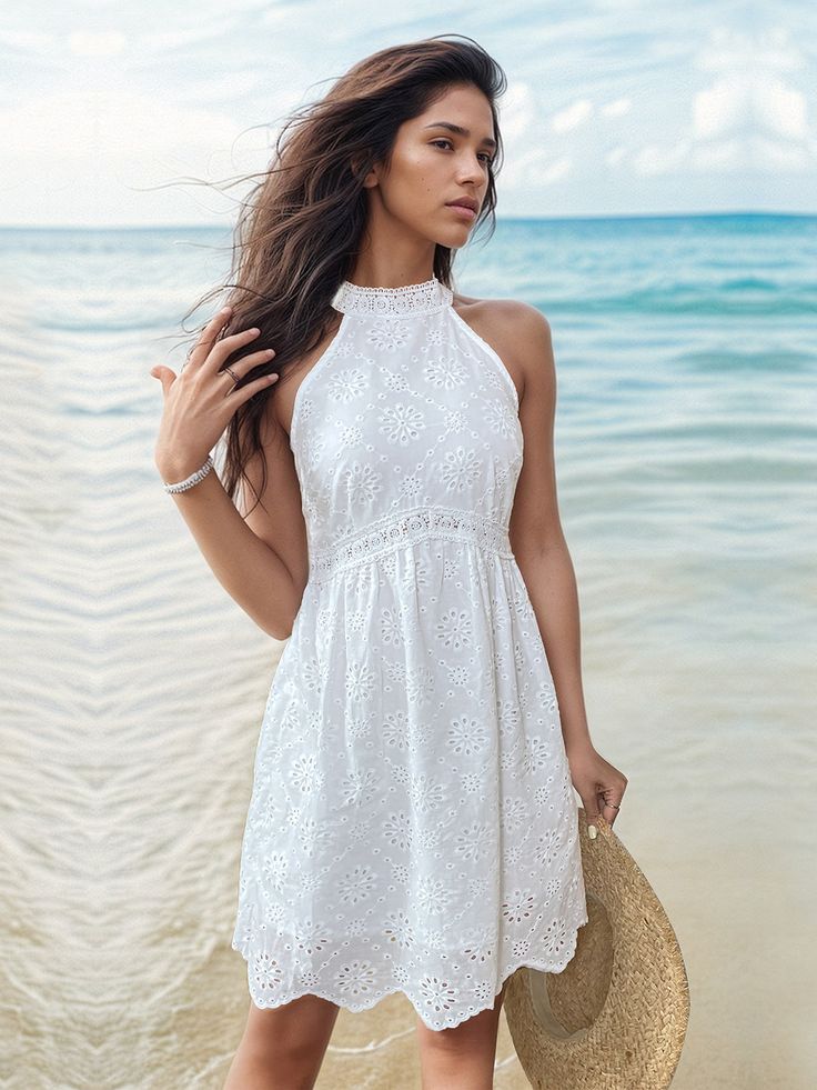 Experience effortless summer style in our Eyelet Grecian Neck Mini Dress! This stunning white dress is perfect for any occasion, from casual outings to special events. With its eyelet detailing and Grecian neckline, you'll look effortlessly chic and feel comfortable all day long. This product typically ships in 5-10 days. Features: Eyelet Sheer: Opaque Stretch: Slightly stretchy Body: Not lined Material composition: 100% polyester Care instructions: Machine wash cold. Tumble dry low. Imported Si Patchwork Dresses, Summer Mini Dress, White Halter Dress, Blue Zone, Mini Sundress, White Sleeveless Dress, Patchwork Dress, Eyelet Dress, Mini Dresses Summer