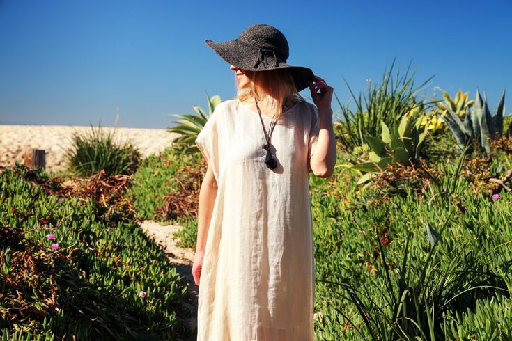 Whether you will wear it as an over-bikini cover-up, or as a dress on its own, you will be able to achieve an elevated look with our Collette Kaftan. Delicate and sophisticated, this linen kaftan will be a perfect fit at a resort by the sea, or at any poolside setting. You can also wear it as a tunic over a slip dress, shorts and even jeans. Collette Kaftan is one size. Due to its breathable transparency, you can purchase it together with our Leah cotton slip dress, that is available in sizes S, Elegant Linen Maxi Dress For Beach, Maxi Length Linen Dress For Vacation, Maxi Linen Dress For Vacation, Vacation Linen Maxi Dress, Linen Maxi Dress For Beach Cover-up, Elegant Linen Kaftan For Summer, Elegant Linen Tunic For The Beach, Maxi Linen Dress For The Beach, Chic Linen Tunic For Vacation