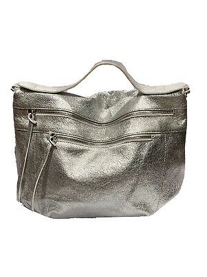 (eBay) ��53843 -Italian Hobo Handbag-Silver Italian soft leather bag weights 1.5 pounds big back zippered pocket and one medium zippered pocket in front with long leather pulls, distress leather with nice stitching touch, detachable and adjustable leather strap, top wide leather handle as one piece attached to the bag, black color fabric lining with very delicate metallic stripes, 1 zippered and 1 open tissue pocket inside bag Travel Shoulder Bag With Silver-tone Hardware In Metallic, Metallic Shoulder Bag With Silver-tone Hardware For Travel, Metallic Bags With Silver-tone Hardware For Everyday, Metallic Shoulder Bag With Silver-tone Hardware For Everyday, Designer Silver Leather Shoulder Bag, Modern Metallic Silver Bags For Everyday Use, Silver Leather Tote Satchel, Silver Leather Top Handle Shoulder Bag, Leather Silver Satchel For Everyday Use