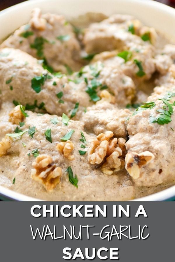 the chicken in a walnut - garlic sauce is ready to be eaten and served for dinner