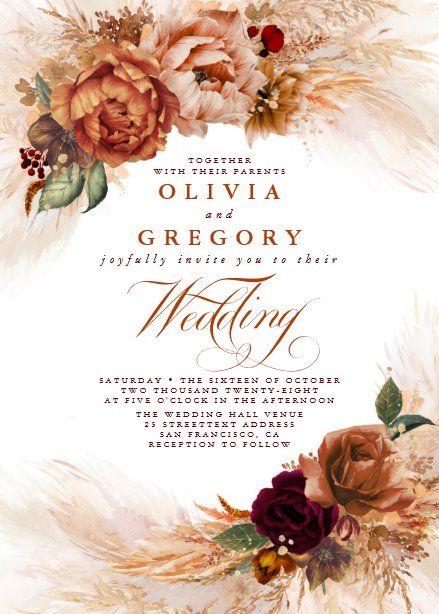 an elegant wedding card with flowers and feathers