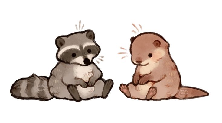 two small animals sitting next to each other