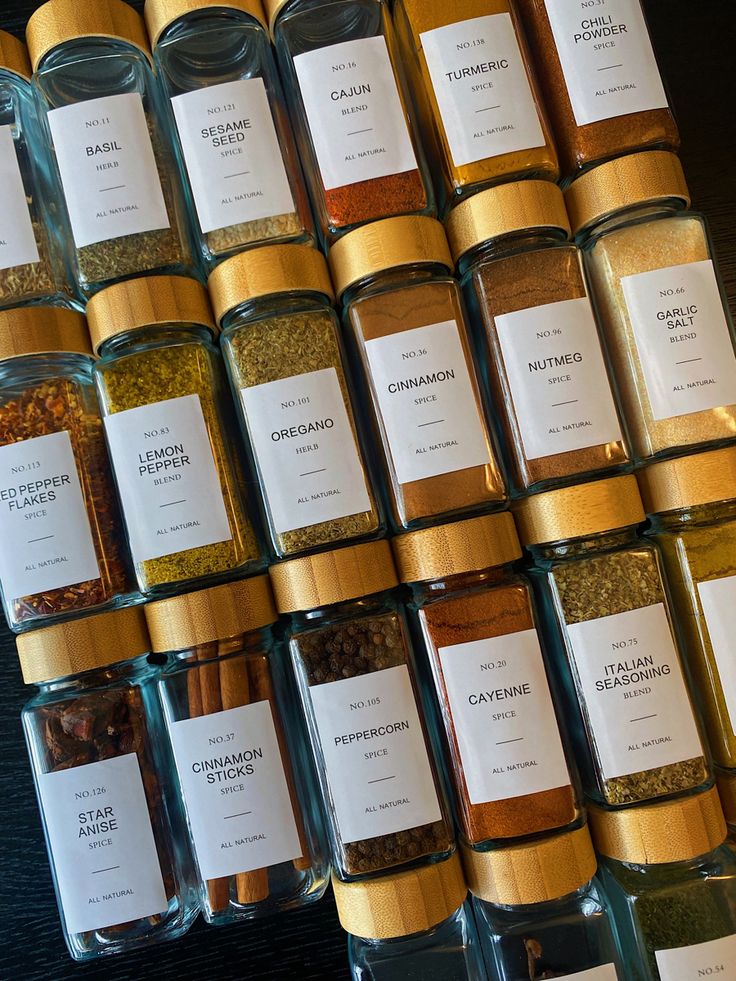 many jars filled with different types of spices