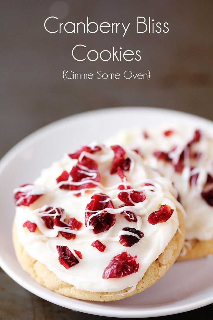 two cranberry bliss cookies on a white plate