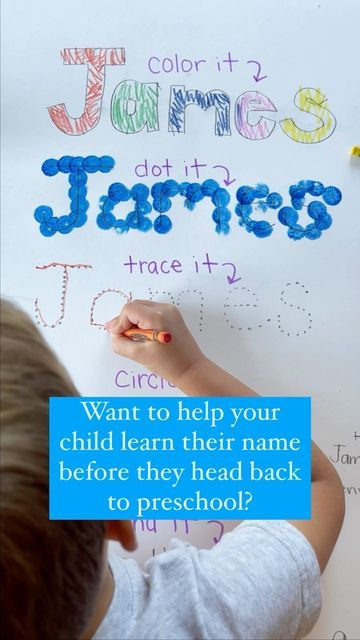 a young boy writing on a whiteboard with the words james written in blue