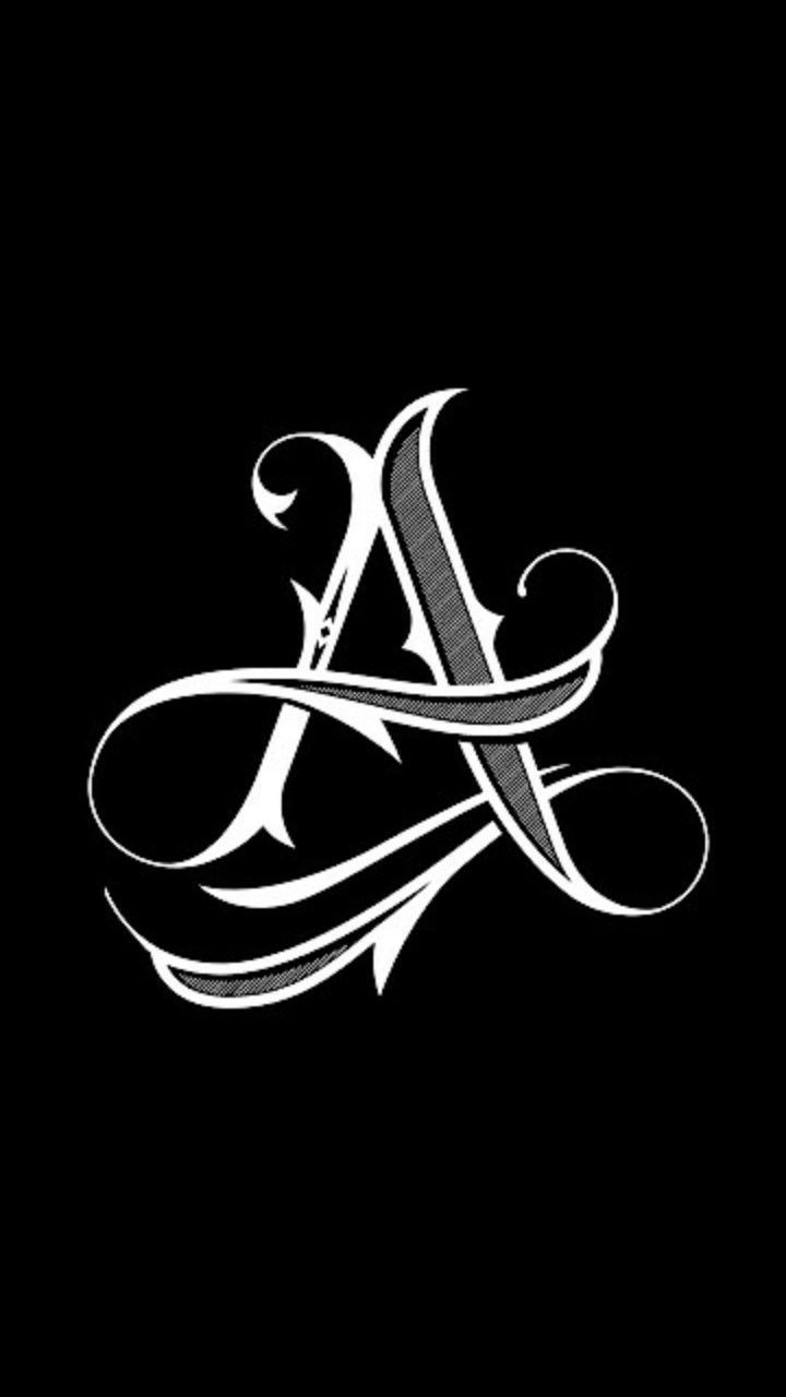 the letter a is made up of swirls and scrolls on a black background with white lettering