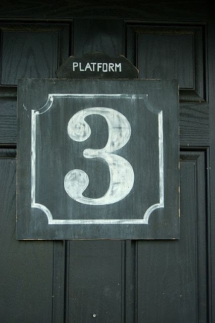 a black door with a sign that says platform 3