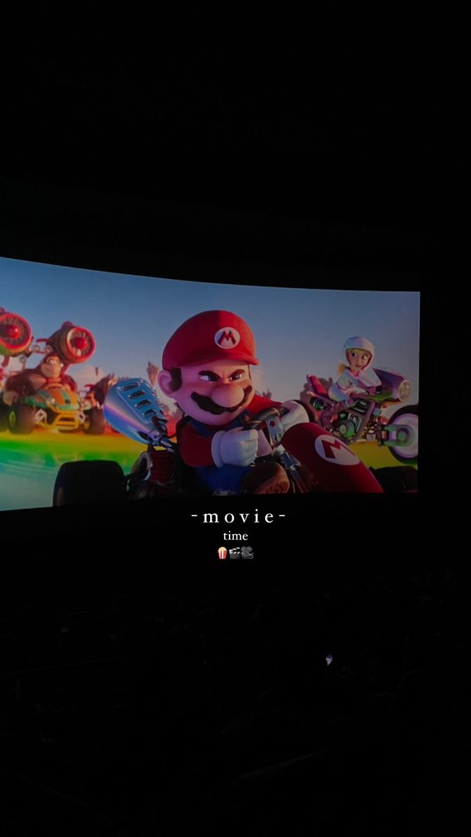 an image of mario kart racing on the nintendo wii game console in the dark