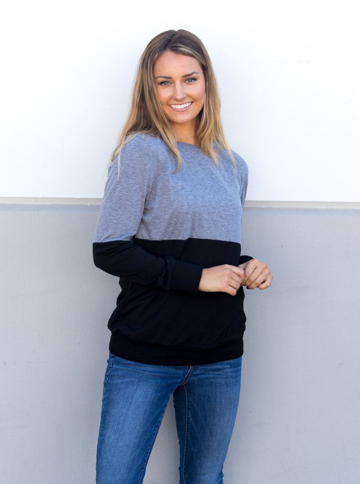 These lightweight colorblock pullovers are perfect for any occasion and will go with any outfit. Great for layering and will make a bold statement! This pullover will soon become a crowd favorite, make sure to grab yours now! Sizing: Small 0-4 Medium 6-8 Large 10-12 XL 12-14 Trendy Gray Sweatshirt For Layering, Casual Long Sleeve Sweater With Contrast Colors, Black Tops With Contrast Color For Layering, Black Long Sleeve Sweater With Splicing, Casual Color Block Sweater, Black Long Sleeve Tops With Color Matching, Contrast Color Block Long Sleeve Tops, Sporty Contrast Color Tops For Fall, Black Long Sleeve Color Block Tops