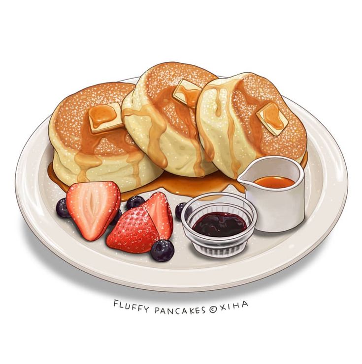 pancakes with syrup and strawberries on a plate