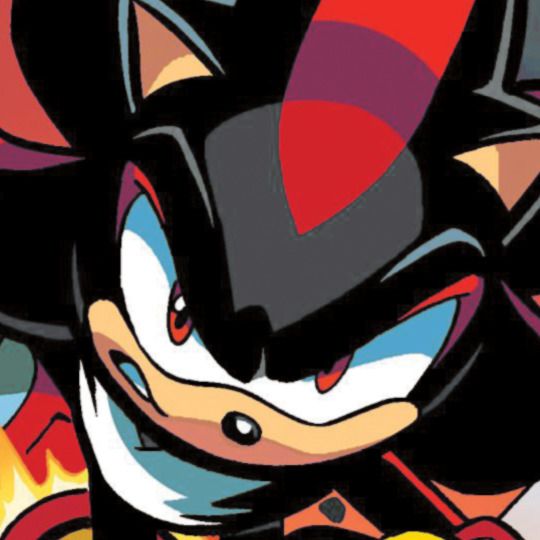 sonic the hedgehog is in front of a colorful background with black, red and white colors