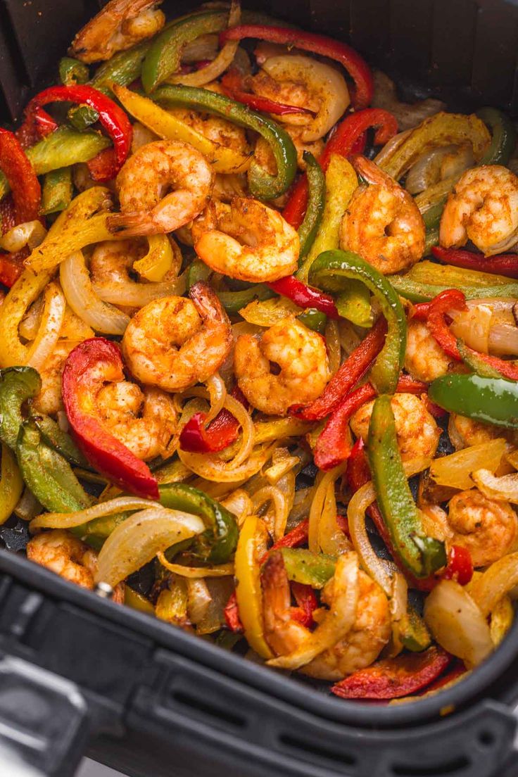 shrimp and bell peppers in an air fryer