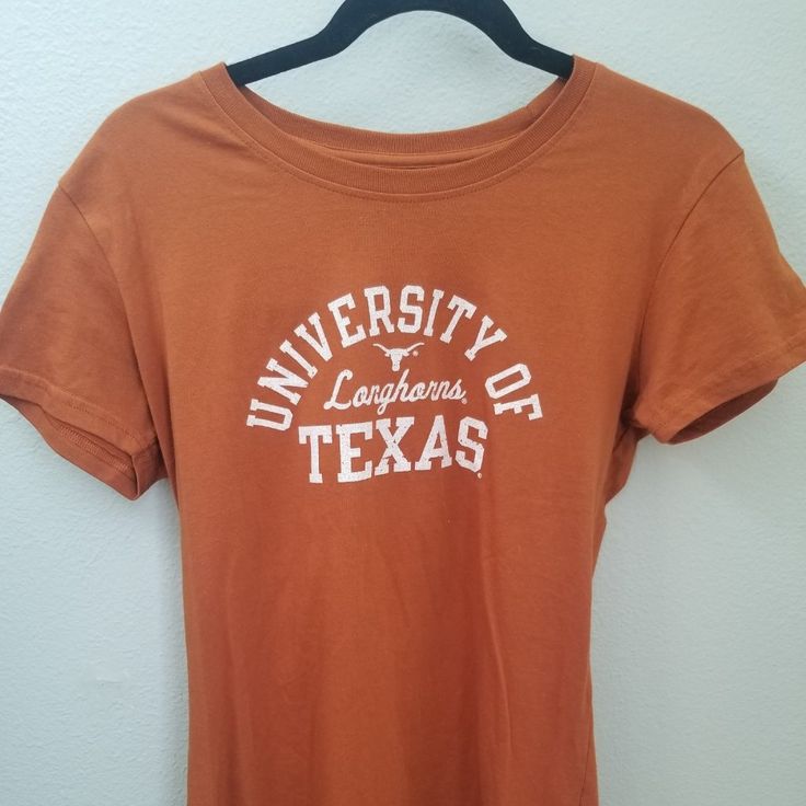 University Of Texas Longhorn T-Shirt. New And Ready For Game Day Youth Large Short Sleeve School Spirit Shirt For Spring, School Spirit Short Sleeve Shirt For Spring, School Spirit Short Sleeve Tops With Text Print, Short Sleeve Shirt With School Spirit For Spring, Short Sleeve Tops With School Spirit Text Print, Short Sleeve Shirt For Spring With School Spirit, Short Sleeve Tops With Text Print For School Spirit, Orange Short Sleeve T-shirt For College, Casual Orange Cotton T-shirt