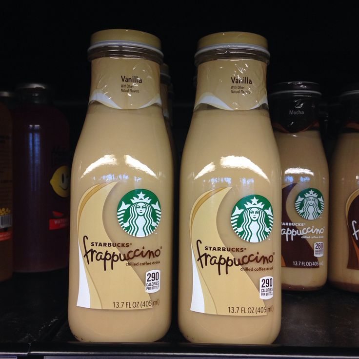 three bottles of starbucks frappuccino coffee sit on a shelf