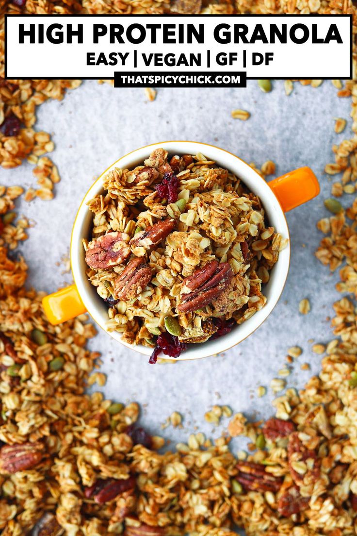 an overhead view of granola in a bowl with the text high protein granola easy vegan gf