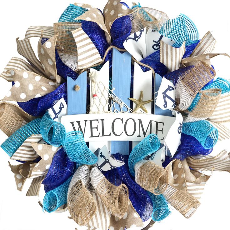 a welcome wreath with blue, white and tan ribbons