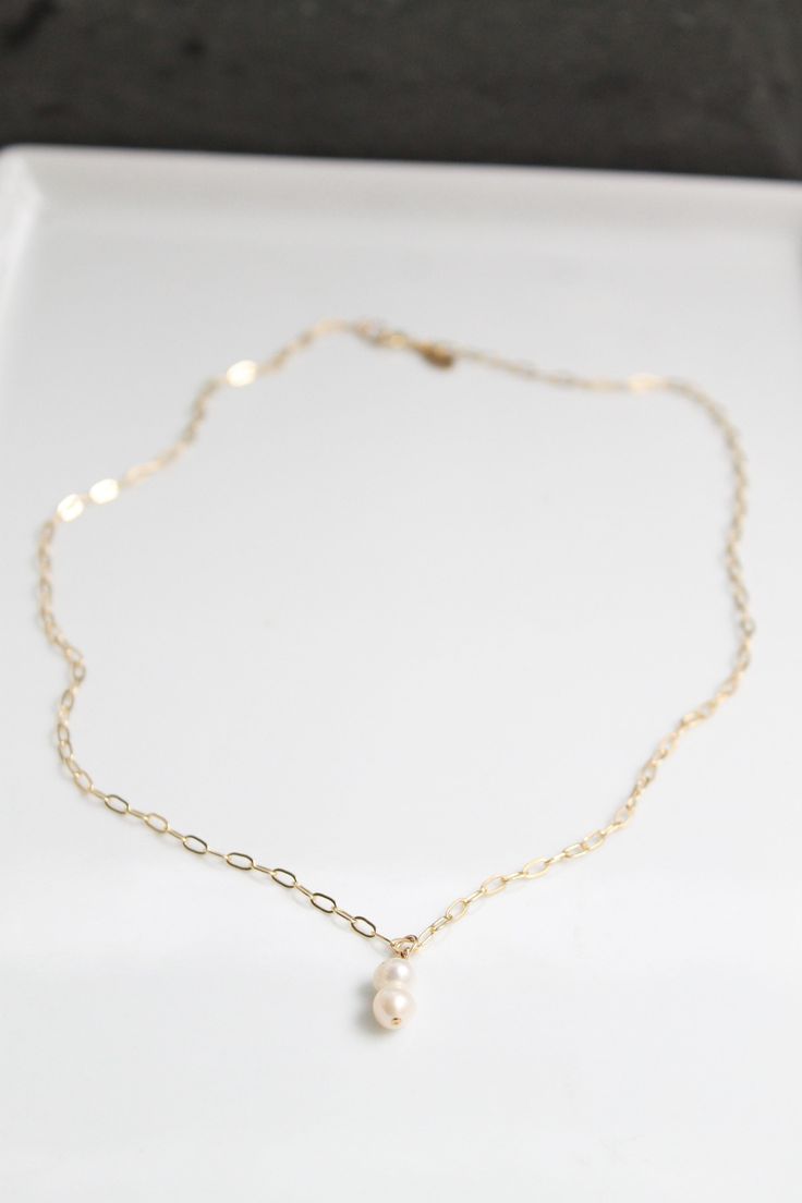 14k gold paperclip chain with freshwater Pearl please add in notes if you would like the necklace with 1 or 2 pearls Delicate 14k Gold-filled Paperclip Chain Jewelry, Delicate 14k Gold Filled Paperclip Chain Jewelry, Delicate 14k Gold Necklace With Paperclip Chain, Minimalist 14k Gold Filled Paperclip Chain Jewelry, Dainty 14k Gold Filled Jewelry With Pearl Charm, Simple Paperclip Chain Necklace As Gift, Everyday 14k Gold Filled Jewelry With Pearl Pendant, Simple Paperclip Chain Necklace Gift, 14k Gold-filled Delicate Paperclip Chain Jewelry