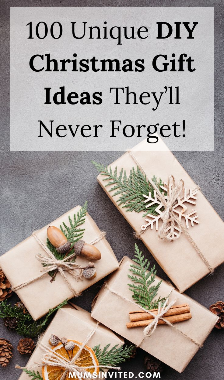 presents wrapped in brown paper with pine cones and cinnamons on top, next to an orange