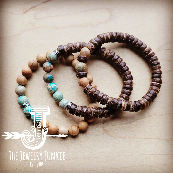 This set of three stretch bracelets combines Imperial Jasper beads and wood beads for a stunning combination of earthy tones and textures. Stylish and versatile, this trio of bracelets is the perfect accessory for modern boho looks and western-inspired ensembles. 8-10mm beaded stretch bracelet Made of Wood and Genuine Imperial Jasper Beads Stretch bracelet fits a variet of wrist sizes Although your item will resemble the photo, each piece is created by hand, so no two are identical.Thank you for Brown Stretch Bracelet With Stackable Round Beads, Brown Stackable Stretch Bracelet With Round Beads, Brown Stackable Bracelet With Round Beads, Bohemian Brown Stretch Bracelet With 8mm Beads, Rustic Adjustable Wooden Bead Jewelry, Adjustable Bohemian Stretch Bracelet With Wooden Beads, Bohemian Brown Stackable Bracelets, Bohemian Stretch Bracelet For Everyday, Bohemian Stretch Bracelet With Brown Round Beads