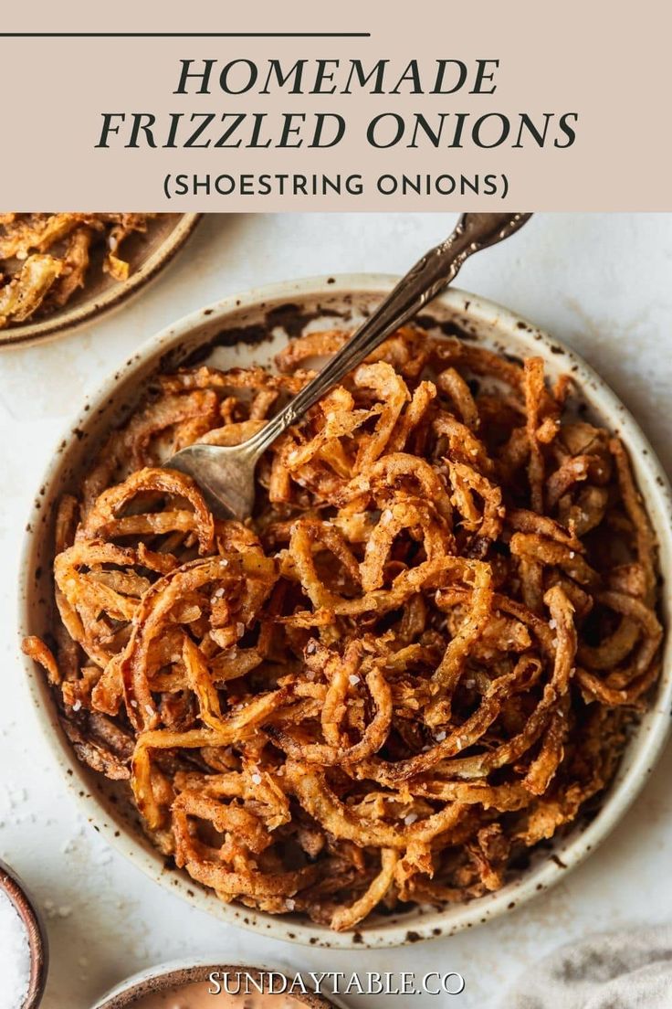 homemade frizzled onions in a bowl with a spoon